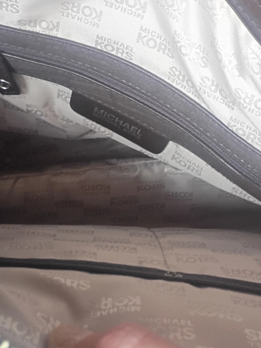 Michael Kors Brown Leather Travel Bag with Silver Hardware